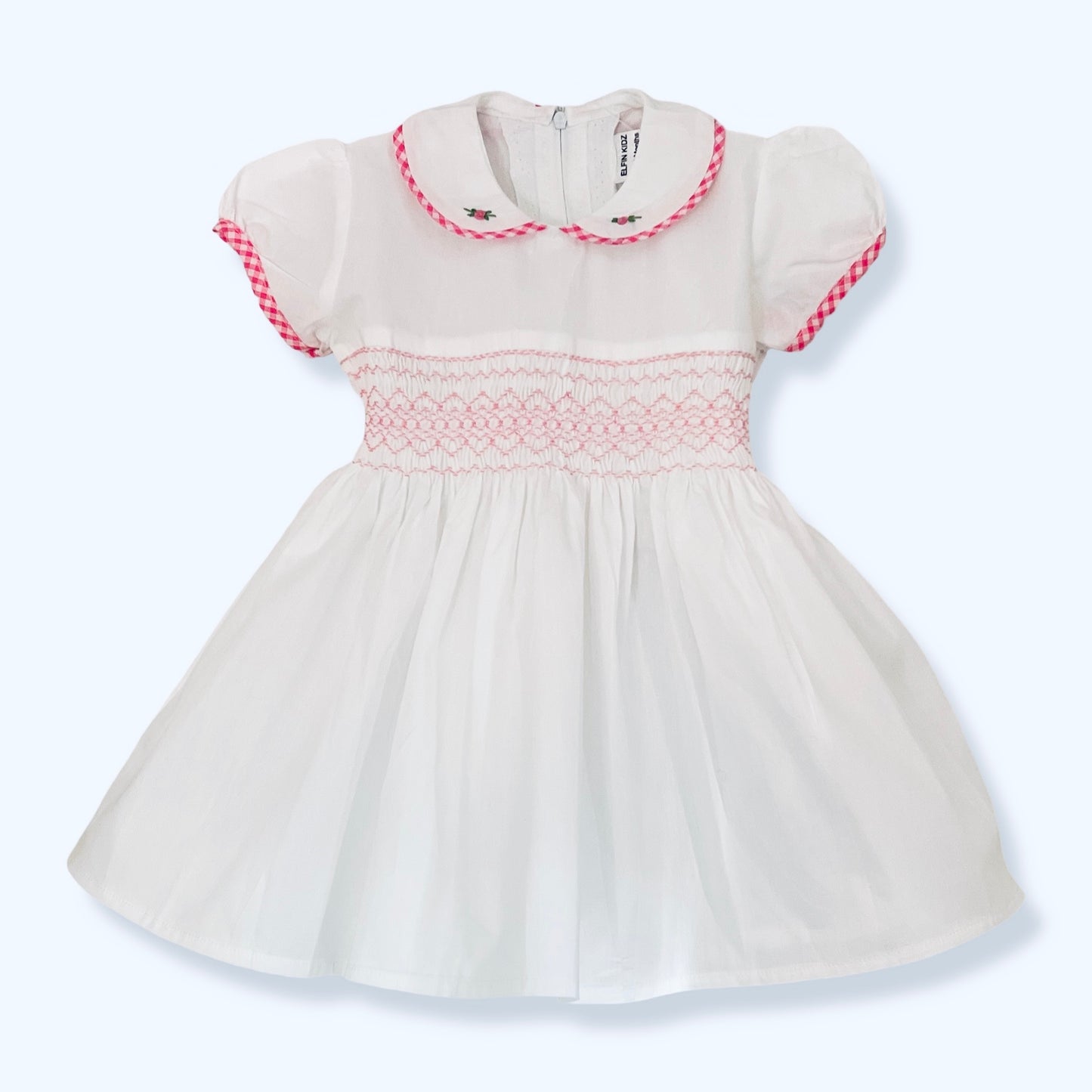 white hand smock dress